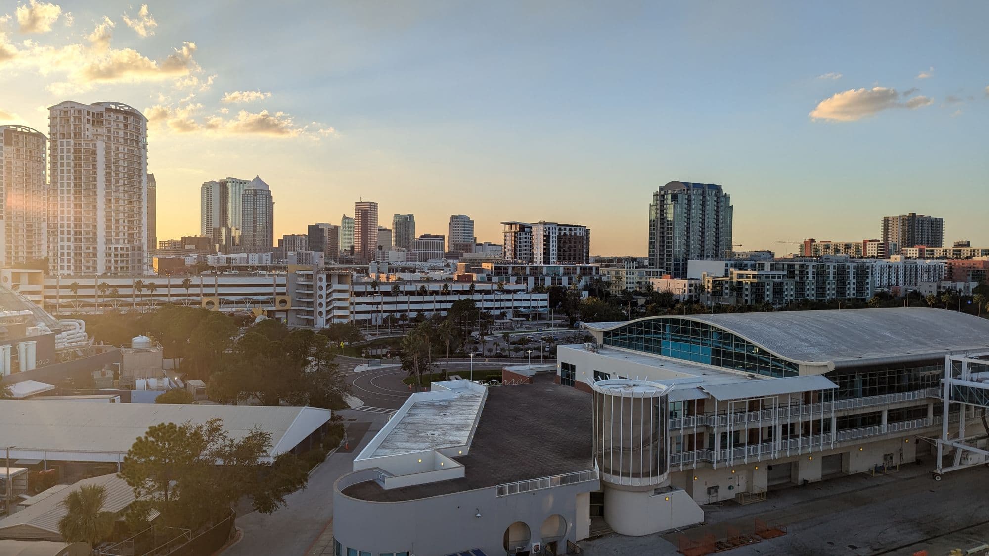 The downtown Tampa skyline at sunset, seen across the water.